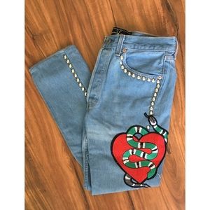 American Vintage Studded snake appliqué mom jeans.